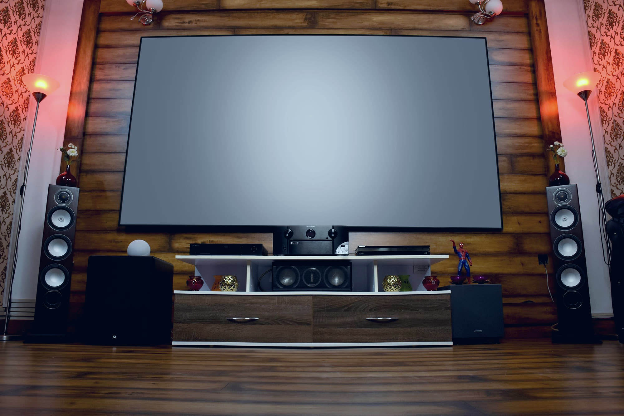 Penthouse home theater with tunable lighting and acoustic treatment